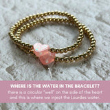 BRACELET-HOLY WATER STRETCH PINK HEART GOLD