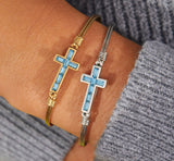 CRYSTAL BAGUETTE CROSS  BRASS AQUAMARINE BRACELET