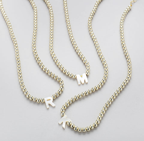 NECKLACE-INITIAL BEAD GOLD